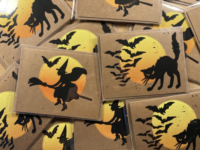 Picture of a handful of packaged-up Halloween 2022 cards